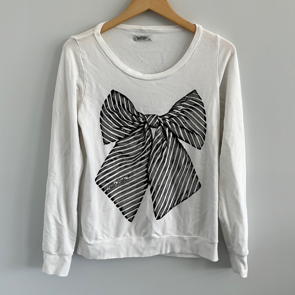 Lauren moshi white long sleeve crewneck shirt with black and white bow graphic